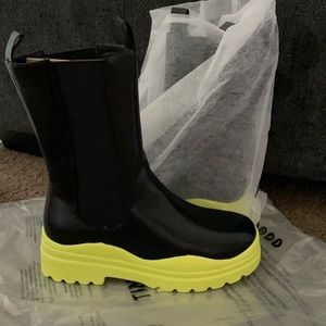 Boots- Black and Neon Green, Brand New , size 9 and never worn.